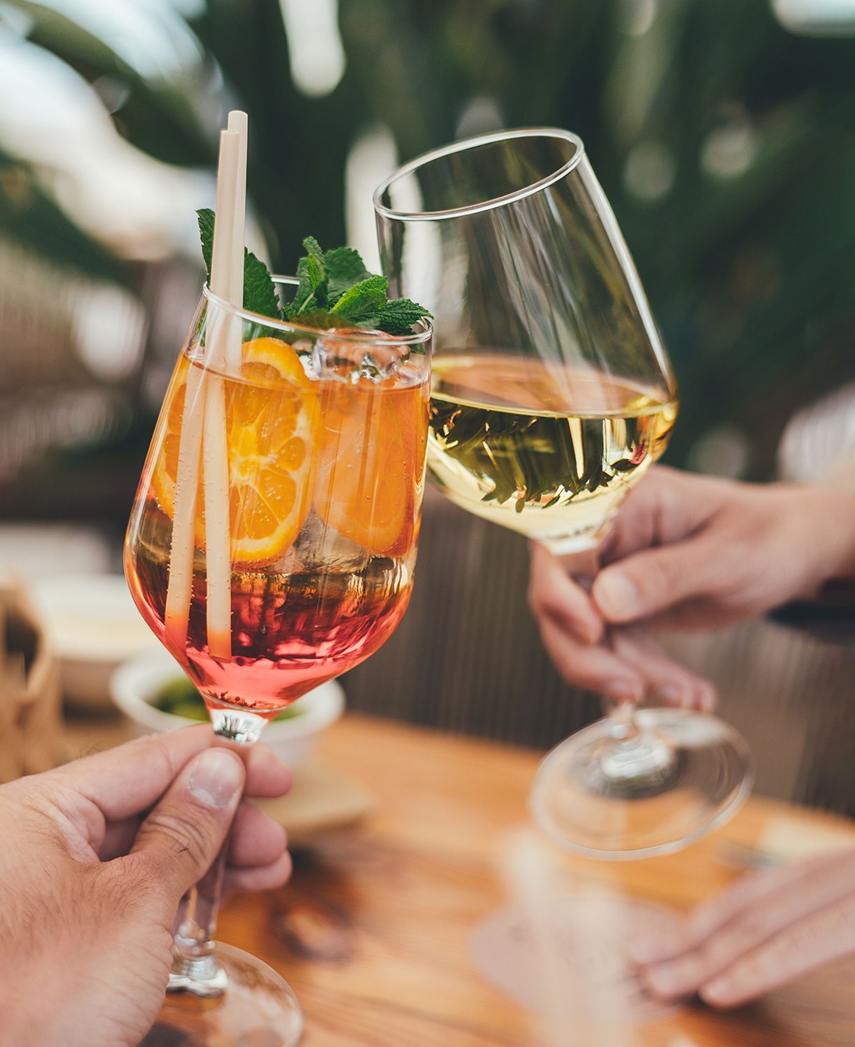 Two glasses toasting in La Cava