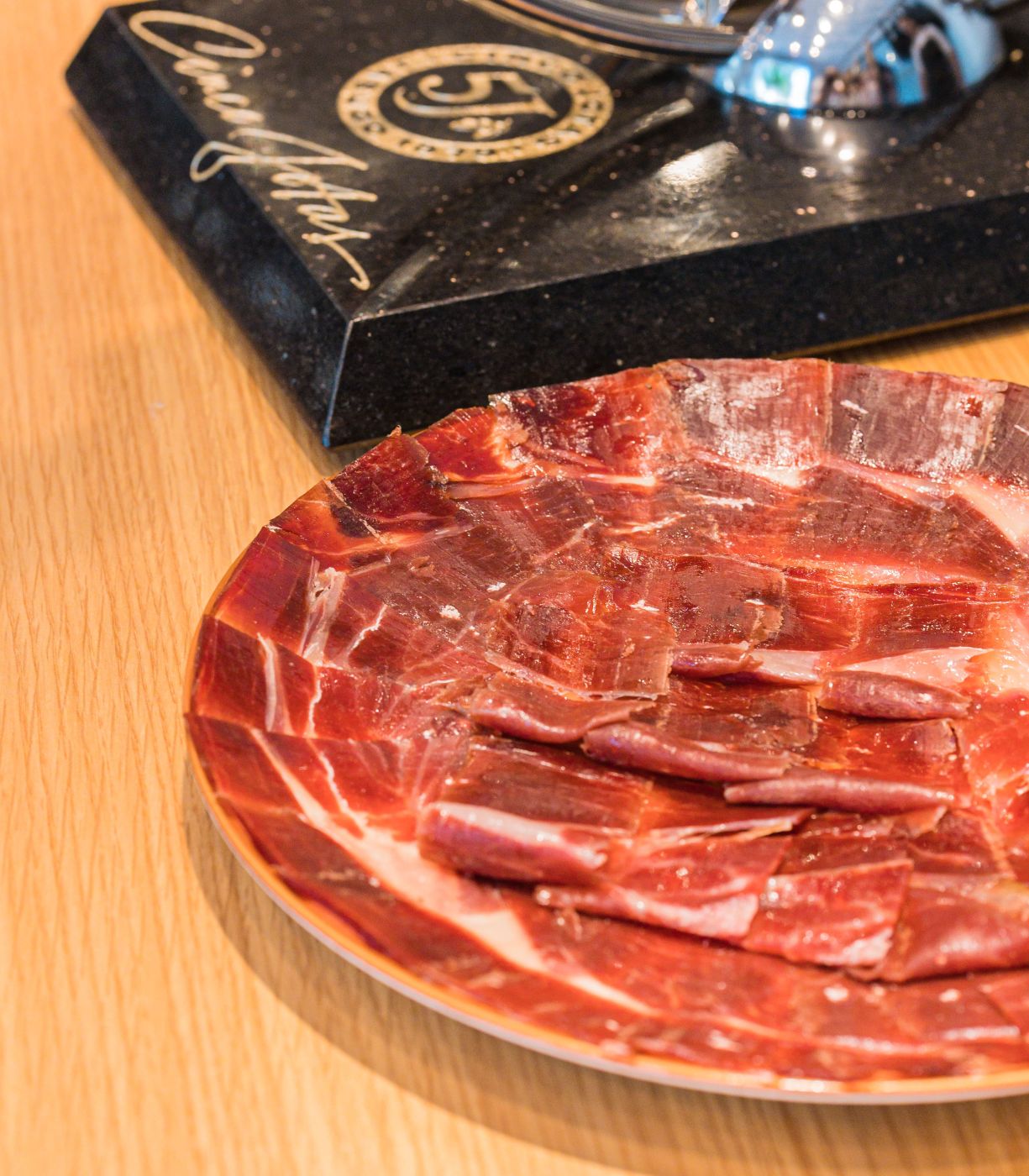 Serrano ham sliced in La Cava